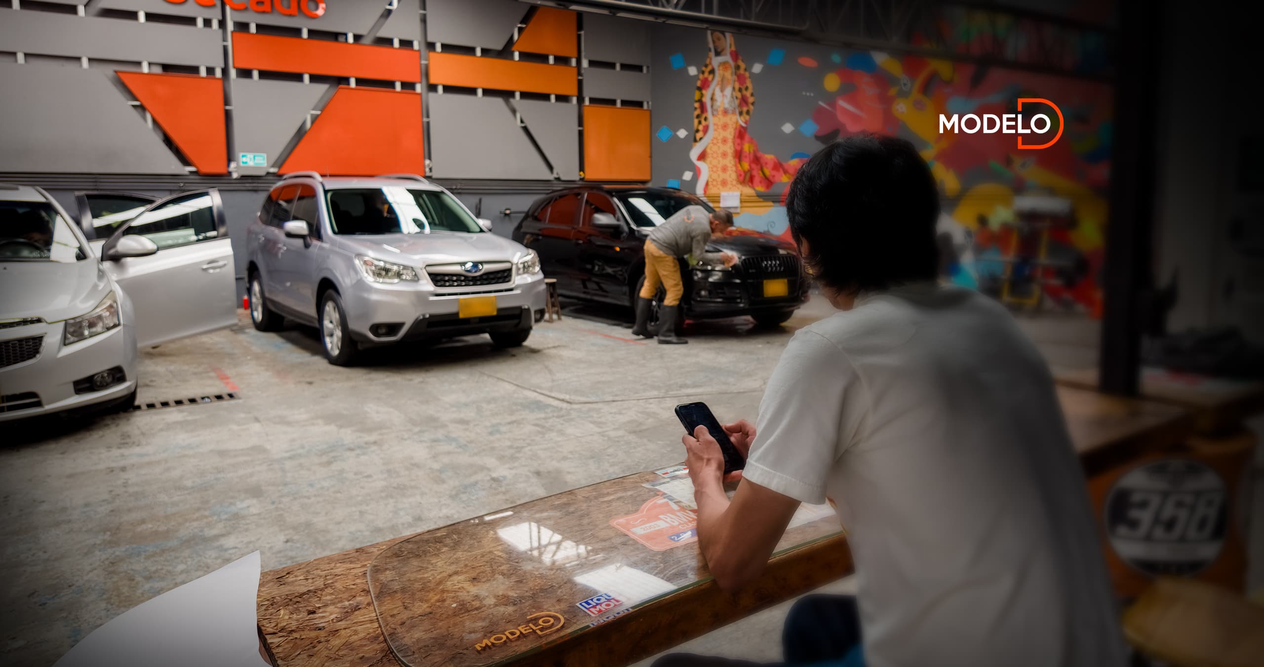Lavado detailing de un carro negro en Modelo D